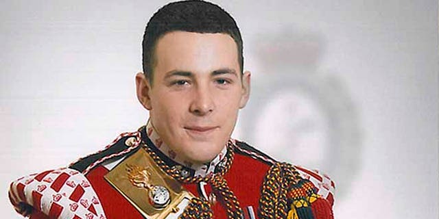 This undated image released May 23, 2013, by the British Ministry of Defense, shows Drummer Lee Rigby, known as Riggers to his friends, who is identified by the MOD as the serving member of the armed forces who was attacked and killed by two men in the Woolwich area of London on Wednesday.
