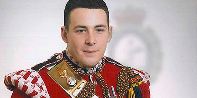 This undated image released May 23, 2013, by the British Ministry of Defense, shows Drummer Lee Rigby, known as Riggers to his friends, who is identified by the MOD as the serving member of the armed forces who was attacked and killed by two men in the Woolwich area of London on Wednesday.