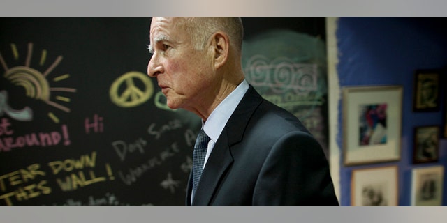 OAKLAND, CA - NOVEMBER 3: California Governor-elect Jerry Brown walks away from the podium after a news conference at his campaign headquarters on November 3, 2010 in Oakland, California.