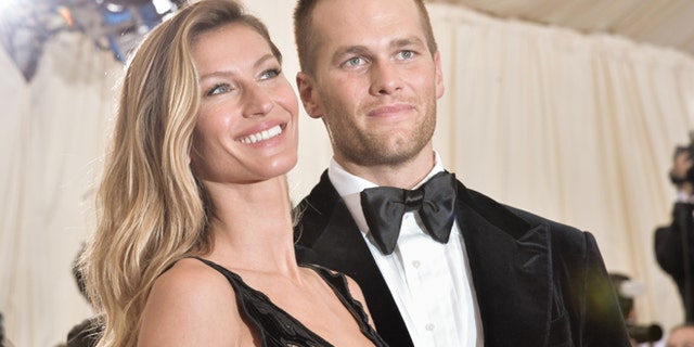 Gisele BŸndchen and Tom Brady attend the "Charles James: Beyond Fashion" Costume Institute Gala at the Metropolitan Museum of Art on May 5, 2014 in New York City. (Photo by Andrew H. Walker/Getty Images)