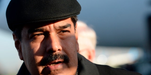 FILE - In this Friday, May 8, 2015, file photo, Venezuela's President Nicolas Maduro is on his arrival at Vnukovo airport in Moscow. Whether its from corruption scandal or stagnant growth, the prospects for the crop of leftist Latin American presidents that have been running the region since the start of the millennium appear to be dimming. No leader has been harder hit than Venezuelan President Nicolas Maduro, who's approval ratings have tumbled amid the crisis to 28 percent, near the lowest in 16 years of socialist rule, and while theres no sign the sometimes violent street protests that overwhelmed the country a year ago will return anytime soon, polls indicate that the opposition will coast to victory in legislative elections expected to take place by year end. (RIA Novosti Pool Photo via AP, File)