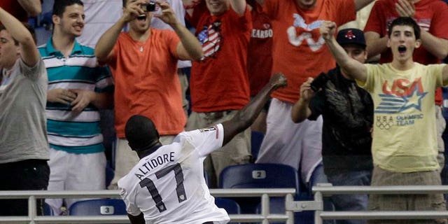 Jozy Altidore celebrates after scoring against Canada in Gold Cup match.