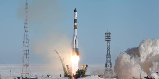 In this photo provided by the Russian Space Agency (Roscosmos) press service, a Soyuz-U booster rocket carrying the Progress MS-05 spacecraft blasts off from the Russian-leased Baikonur Cosmodrome in Kazakhstan Wednesday, Feb. 22, 2017. The unmanned Russian cargo ship lifted off successfully Wednesday on a supply mission to the International Space Station. (Russian Space Agency Roscosmos press service via AP)
