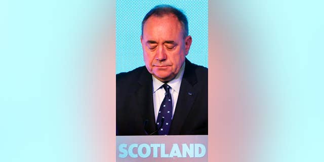 Scottish First Minister Alex Salmond looks down during a press conference in Edinburgh, Scotland, Friday, Sept. 19, 2014. Scottish voters have rejected independence and decided that Scotland will remain part of the United Kingdom. The result announced early Friday was the one favored by Britain's political leaders, who had campaigned hard in recent weeks to convince Scottish voters to stay. It dashed many Scots' hopes of breaking free and building their own nation. (AP Photo/PA, Danny Lawson) UNITED KINGDOM OUT, NO SALES, NO ARCHIVE