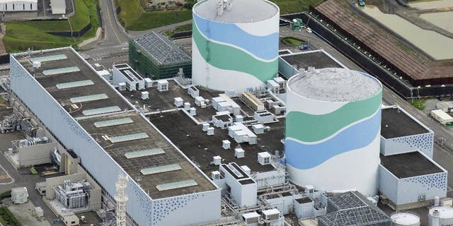 July 7, 2015 - FILE photo shows reactors of No. 1, right, and No. 2 at the Sendai Nuclear Power Station in Satsumasendai, Kagoshima prefecture, southern Japan. Kyushu Electric Power Co. said it will restart the No. 1 reactor at its Sendai nuclear plant Tuesday morning, Aug. 11.
