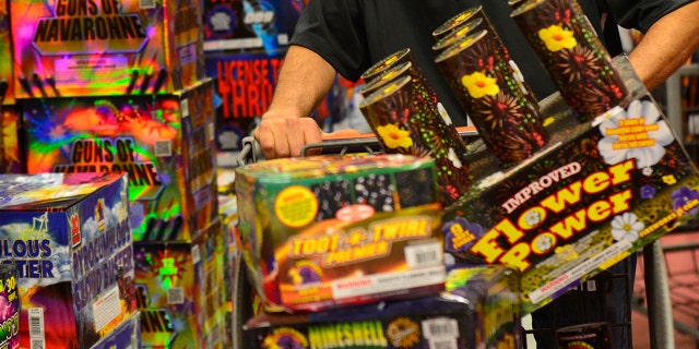 FILE - Fireworks for sale at store.