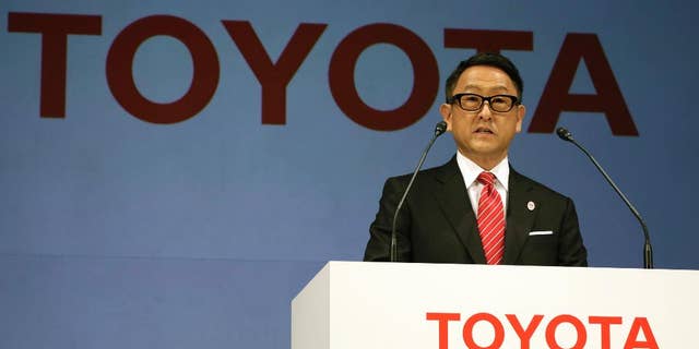 FILE- In this March 13, 2015, file photo, Toyota President and CEO Akio Toyoda speaks during a press conference in Tokyo. Toyota Motor Corp. stock is skidding in Tokyo trading after U.S. President-elect Donald Trump said Thursday, Jan. 5, 2017 on Twitter that the Japanese automaker faces a "big border tax" if it goes ahead with plans on a new Mexico plant. (AP Photo/Eugene Hoshiko, File)