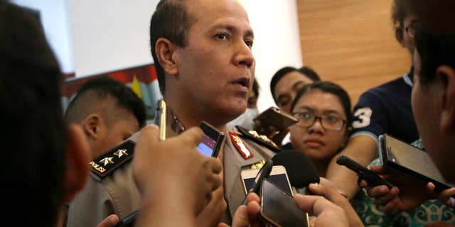 Indonesian National Police spokesman Maj. Gen. Boy Rafli Amar speaks to the media after a press conference at the National Police headquarters in Jakarta, Indonesia, Tuesday, July 19, 2016. Two suspected militants were killed Monday in the shootout in a remote jungle area of Sulawesi where security forces have been pursuing the country's most wanted Islamic militant Santoso and his followers for months. (AP Photo/Tatan Syuflana)