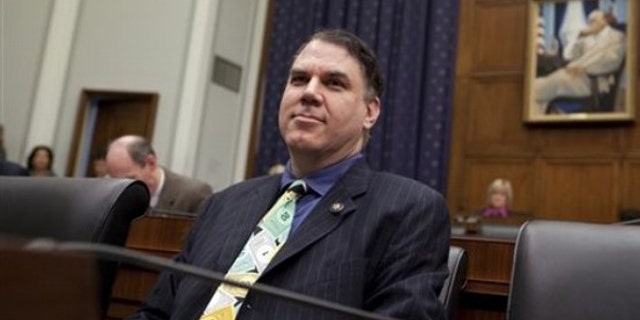 Oct. 1, 2009: Rep. Alan Grayson listens to Federal Reserve Chairman Ben Bernanke testify on Capitol Hill in Washington.