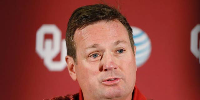 Oklahoma head coach Bob Stoops answers a question during a news conference in Norman, Okla., Monday, Aug. 25, 2014. Some uncertainties have cleared up as No. 4 Oklahoma prepares to open the season Saturday against Louisiana Tech. (AP Photo/Sue Ogrocki)