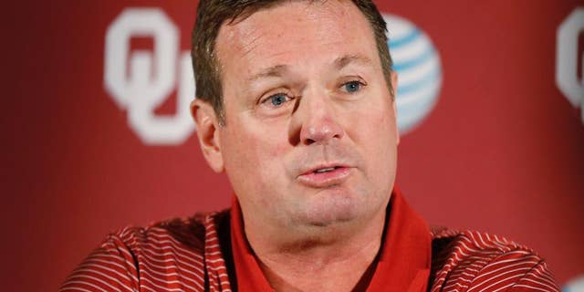 Oklahoma head coach Bob Stoops answers a question during a news conference in Norman, Okla., Monday, Aug. 25, 2014. Some uncertainties have cleared up as No. 4 Oklahoma prepares to open the season Saturday against Louisiana Tech. (AP Photo/Sue Ogrocki)