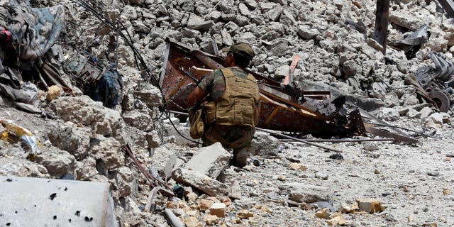 An Iraqi fighter in Mosul on July 3.