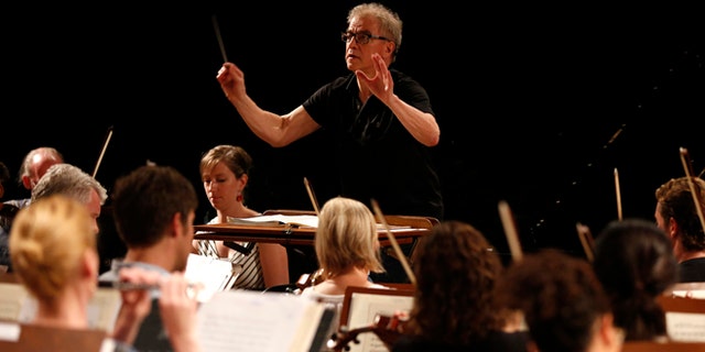 Minnesota Orchestra Music Director Osmo Vanska of Finland conducts a rehearsal in Havana, Cuba, Thursday, May 14, 2015. The Minnesota Orchestra also played Havana in 1929 and 1930, when it was called the Minneapolis Symphony. Fridays all-Beethoven program was a reprise of its 1929 repertoire, with performances of Overture to Egmont, Opus 84, Fantasy in C minor for piano, chorus and orchestra, Opus 80, and Symphony No. 3 in E-flat major, Opus 55. (AP Photo/Desmond Boylan)