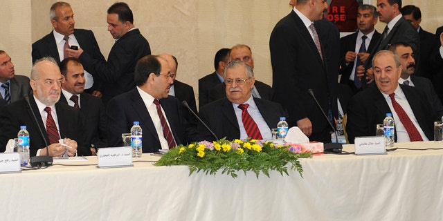 Nov. 8, 2010: leaders of Iraq's main political blocs, front row, from left to right: former Iraqi Prime Minister Ibrahim Jafari, Iraqi Prime Minister Nouri al-Maliki, Iraqi President Jalal Talabani and former Iraqi Prime Minister Ayad Allawi, are seen during their meeting in Irbil, Iraq.
