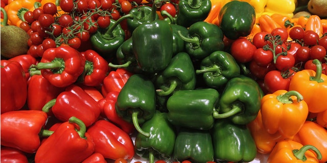 BERLIN, GERMANY - JANUARY 21: Fresh vegetables, including tomatoes and bell peppers, lie on display at the Netherlands hall at the 2011 Gruene Woche agricultural trade fair at Messe Berlin on January 21, 2011 in Berlin, Germany. The trade fair comes on the heels of a dioxon scandal in Germany that led to the recent quarantine of approximately 6,000 farms. (Photo by Sean Gallup/Getty Images)