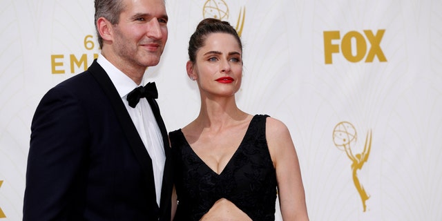 Writer David Benioff and wife, actress Amanda Peet, arrive at the 67th Primetime Emmy Awards in Los Angeles, California September 20, 2015.