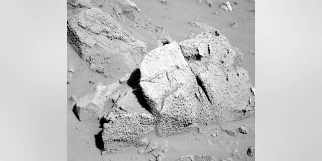 A closer look at rock that is located on the rim of the crater Concepción on Mars. The image was taken by the Mars rover Opportunity back in 2010.