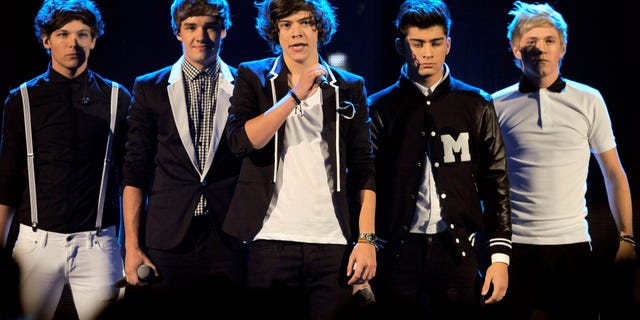 March 31, 2012: From left, Louis Tomlinson, Liam Payne, Harry Styles, Zayn Malik, Niall Horan, of musical group One Direction, perform at Nickelodeon's 25th Annual Kids' Choice Awards in Los Angeles.