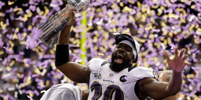 NEW ORLEANS, LA - FEBRUARY 03: Ed Reed #20 of the Baltimore Ravens celebrates with the VInce Lombardi trophy after the Ravens won 34-31 against the San Francisco 49ers during Super Bowl XLVII at the Mercedes-Benz Superdome on February 3, 2013 in New Orleans, Louisiana. (Photo by Ezra Shaw/Getty Images) *** Local Caption *** Ed Reed