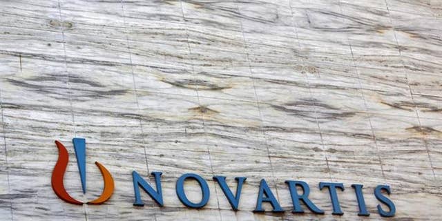 A Novartis logo is pictured on its headquarters building in Mumbai April 1, 2013. REUTERS/Vivek Prakash