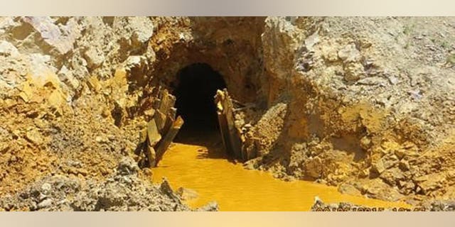 Yellow mine waste water is seen at the entrance to the Gold King Mine in San Juan County, Colorado, in this picture released by the Environmental Protection Agency (EPA) taken August 5, 2015. REUTERS/EPA/Handout