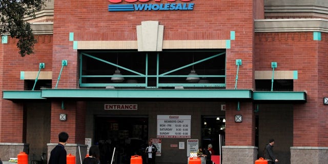 Shoppers are pictured outside a Costco Wholesale store in Los Angeles, California March 6, 2013. REUTERS/Mario Anzuoni