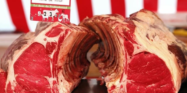 Meat is offered for sale at a street market in Paris March 11, 2012. REUTERS/Mal Langsdon
