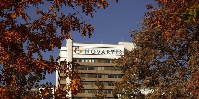The logo of Swiss pharmaceutical company Novartis is seen on its headquarters building in Basel, Switzerland October 27, 2015. REUTERS/Arnd Wiegmann