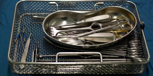 Surgery instruments are pictured during procedures to clean the wound of an amputee patient with MRSA (Methicillin resistant Staphylococcus Aureus) in the operating theatre at the Unfallkrankenhaus Berlin (UKB) hospital in Berlin February 29, 2008. REUTERS/Fabrizio Bensch