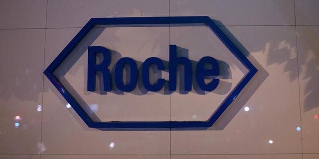 The logo of Swiss pharmaceutical company Roche is seen outside the Shanghai Roche Pharmaceutical Co. Ltd. headquarters in Shanghai May 22, 2014. REUTERS/Aly Song