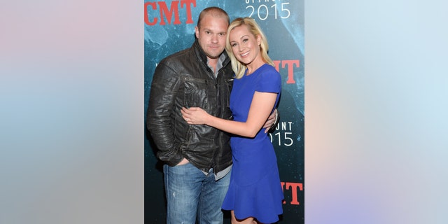 Singer Kellie Pickler and husband Kyle Jacobs attend the 2015 CMT Upfront event at the TimesCenter on Thursday, April 2, 2015, in New York.
