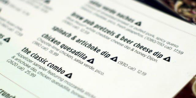 A new menu from Applebeeâs restaurant is seen at one of its outlet in the Manhattan borough of New York City