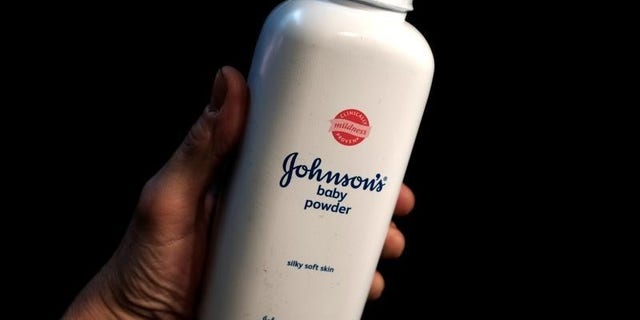 A bottle of Johnson's Baby Powder is seen in a photo illustration taken in New York