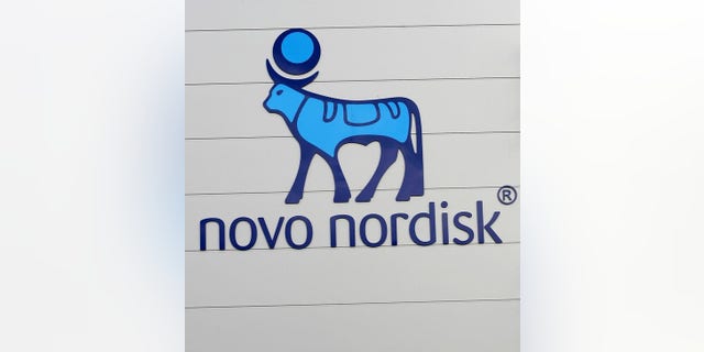 The logo of Danish multinational pharmaceutical company Novo Nordisk is pictured on the facade of a production plant in Chartres