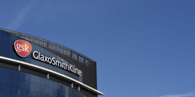 Signage for GlaxoSmithKline is seen on it's offices in London, Britain