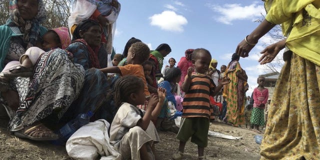 Malnourished children wait for medical attention at the Halo health post in Halo village, a drought-stricken area in Oromia region in Ethiopia