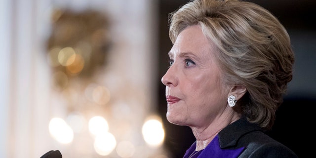 Hillary Clinton pauses while speaking in New York, Wednesday, Nov. 9, 2016, where she conceded her defeat to Republican Donald Trump after the hard-fought presidential election