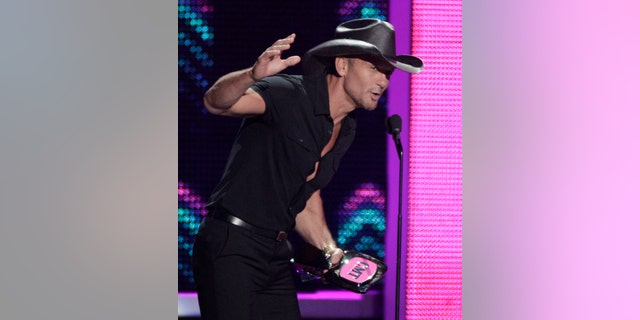 Tim McGraw accepts the award for video of the year for Humble and Kind at the CMT Music Awards at the Bridgestone Arena on Wednesday, June 8, 2016, in Nashville, Tenn. (Photo by Wade Payne/Invision/AP)