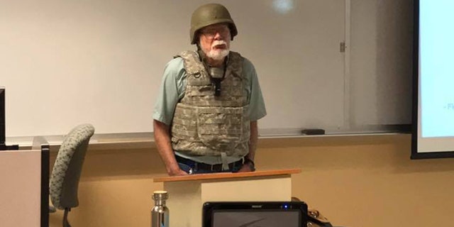 Professor Charles K. Smith of San Antonio College wore full combat gear to protest Texas' campus carry law.