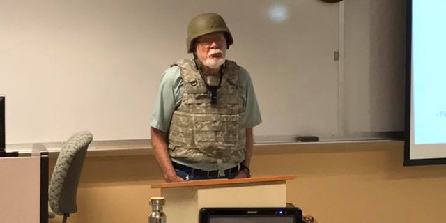 Professor Charles K. Smith of San Antonio College wore full combat gear to protest Texas' campus carry law.