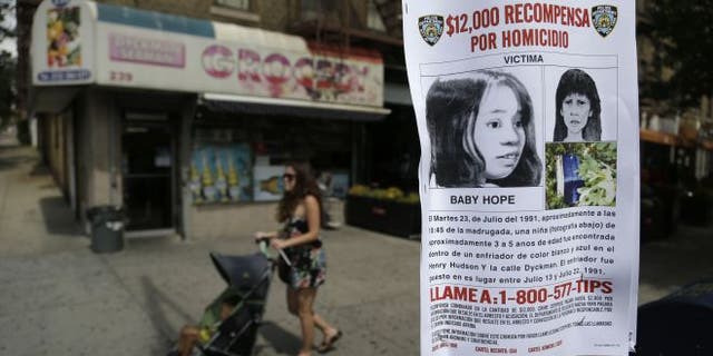 July 23, 2013: This photo shows a poster soliciting information regarding an unidentified body near the site where the body was found in New York. (AP)