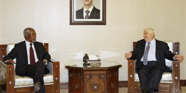 May 28, 2012: UN-Arab League Joint Special Envoy for Syria (JSE) Kofi Annan, left, meets with Syrian Foreign Minister Walid Moallem, right, in Damascus, Syria.