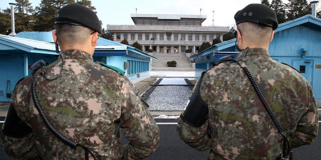 South Korean soldiers stand guard at the truce village of Panmunjom in the demilitarized zone separating the two Koreas.