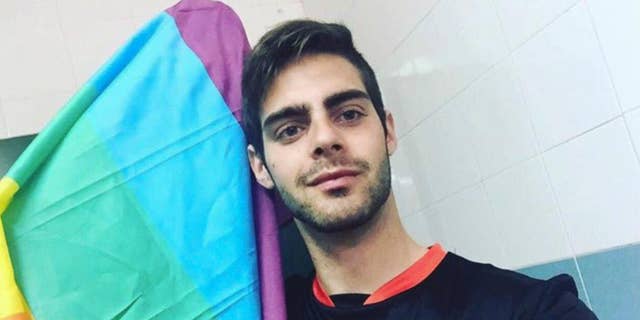 In this Friday, April 1, 2016 photo, Jesus Tomillero poses for a selfie at his home in La Linea, Cadiz, southern Spain. Tomillero, a gay Spanish soccer referee is giving up the job after repeatedly being the target of verbal abuse at games because of his sexual orientation. (AP Photo/Jesus Tomillero)