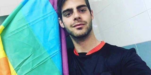 In this Friday, April 1, 2016 photo, Jesus Tomillero poses for a selfie at his home in La Linea, Cadiz, southern Spain. Tomillero, a gay Spanish soccer referee is giving up the job after repeatedly being the target of verbal abuse at games because of his sexual orientation. (AP Photo/Jesus Tomillero)