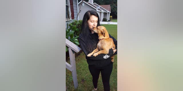 Brittney Speck said her dog is "okay" after being attacked by the tiger Wednesday morning.