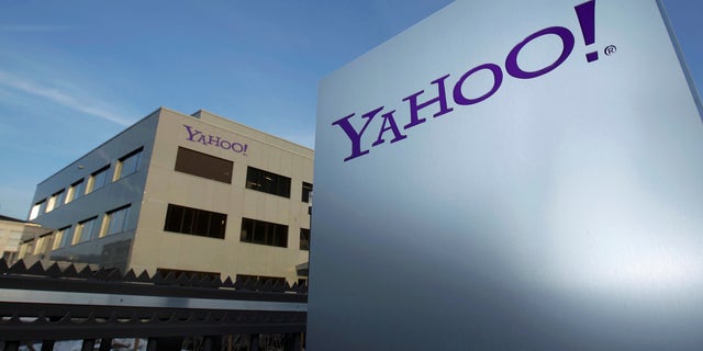 A Yahoo logo is pictured in front of a building in Rolle, 19 miles east of Geneva, December 12, 2012. ( REUTERS/Denis Balibouse/File photo)