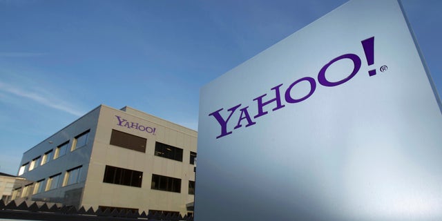 A Yahoo logo is pictured in front of a building in Rolle, 19 miles east of Geneva, December 12, 2012. ( REUTERS/Denis Balibouse/File photo)