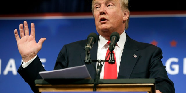 FILE - In this Tuesday, June 16, 2015, file photo, Republican presidential candidate Donald Trump speaks to supporters during a rally, in Des Moines, Iowa. A petition asking NBC to cut ties with Trump because of recent remarks he made on immigration, has collected more than 200,000 signatures. (AP Photo/Charlie Neibergall, File)