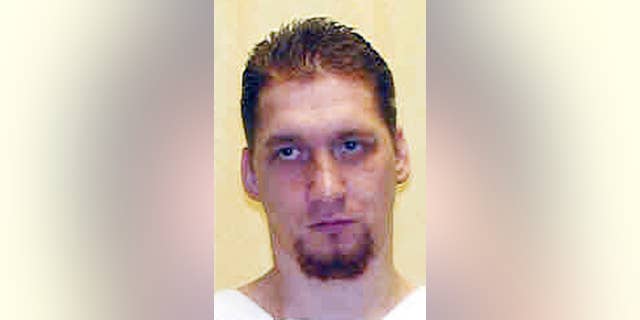 FILE – This undated file photo provided by the Ohio Department of Rehabilitation and Correction shows death row inmate Ronald Phillips, convicted of the 1993 rape and murder of his girlfriend's 3-year-old daughter in Akron, Ohio. Ohio Parole Board members are scheduled to hold a Thursday, Dec. 1, 2016, hearing to consider arguments for and against mercy for Ronald Phillips, the first inmate scheduled for execution under the state's revised lethal injection method that uses a three-drug combination. His execution is scheduled Jan. 12, 2017. (Ohio Department of Rehabilitation and Correction via AP, File)